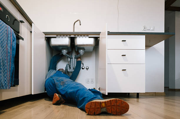 Professional Sewer Line Repair technician working in Hampton, IA
